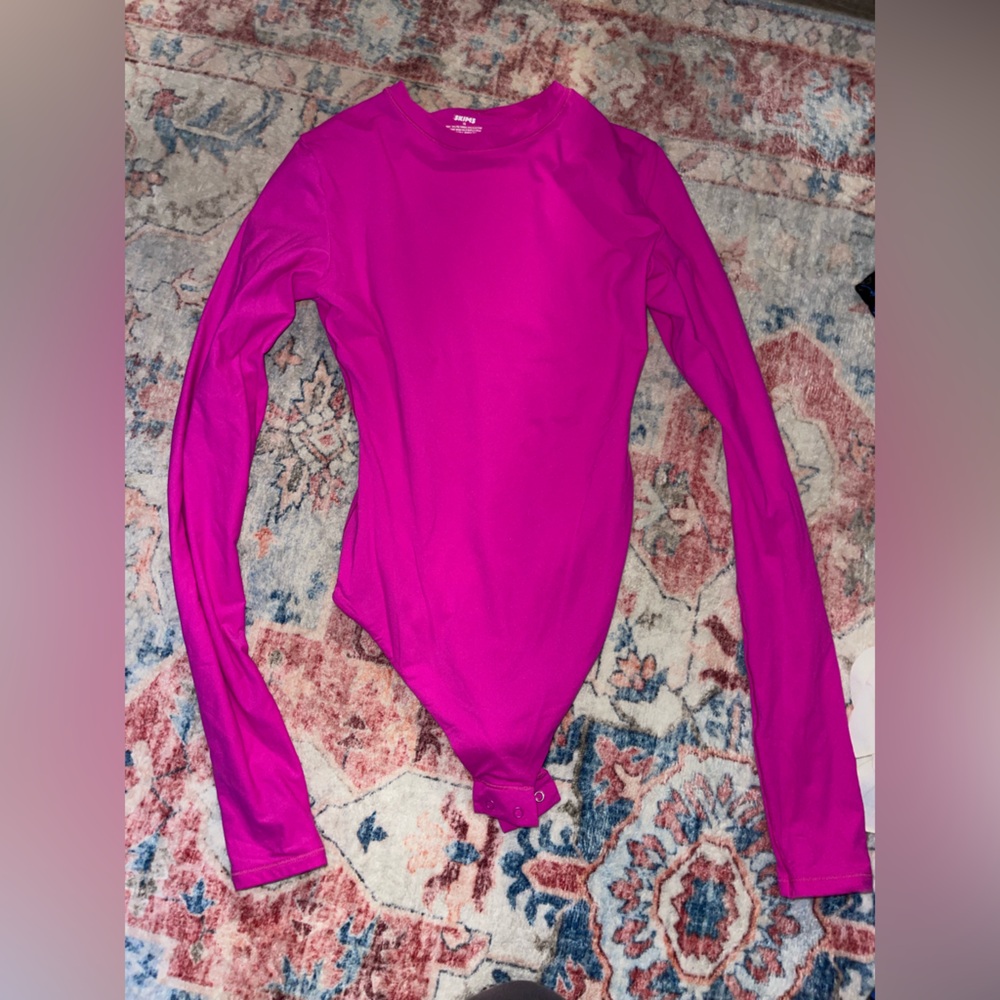 SKIMS Fuchsia Long Sleeve Bodysuit